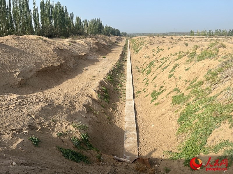 斗渠改造后，大大提高了輸水效率。人民網(wǎng)記者 常雪梅攝