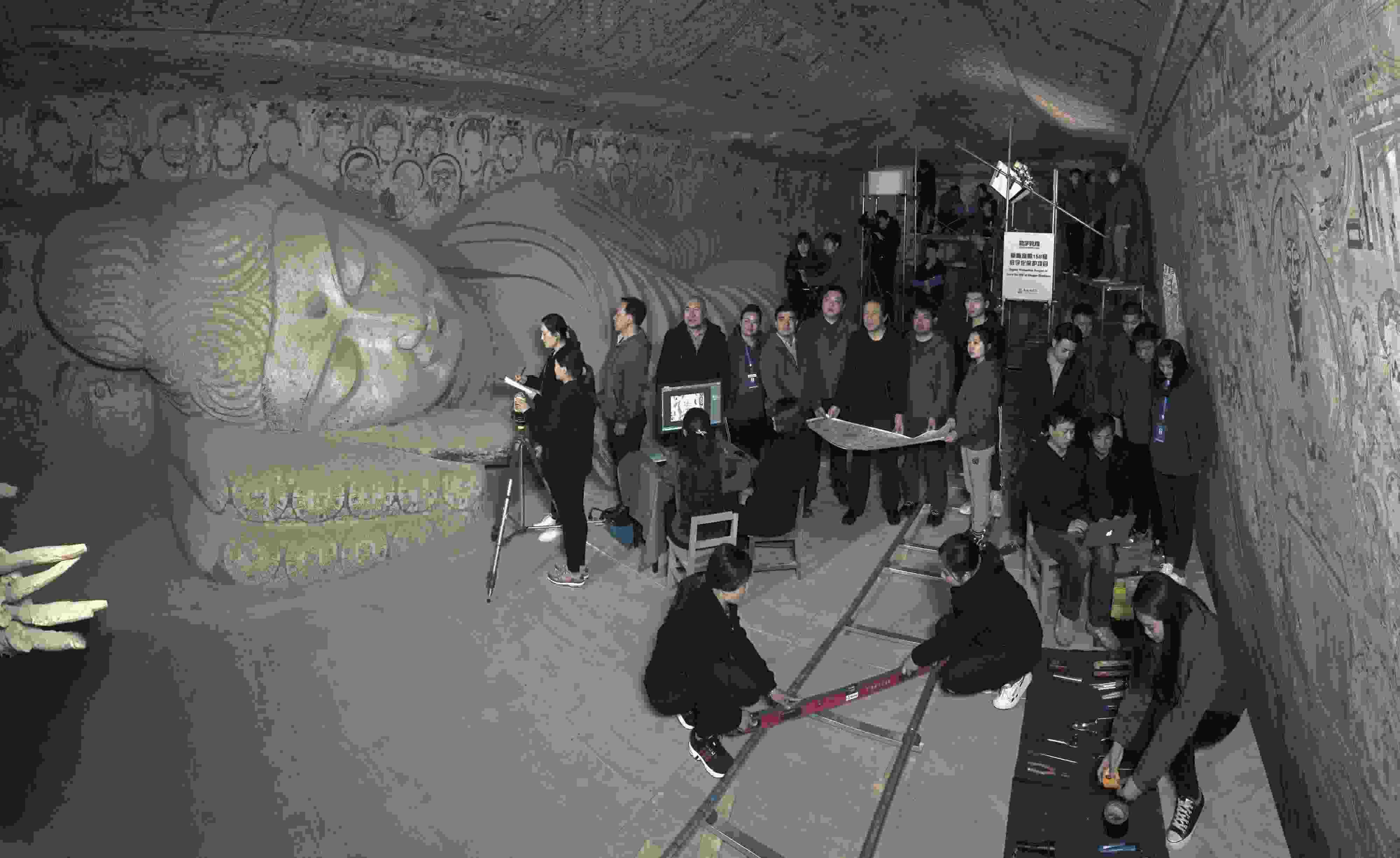 敦煌研究院文物數(shù)字化團隊在莫高窟第158窟工作現(xiàn)場。敦煌研究院供圖